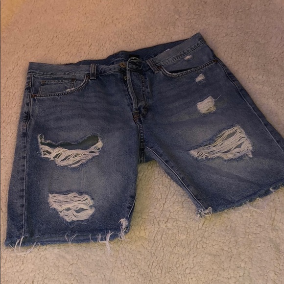 mens denim distressed shorts